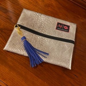 Makeup Junkie Medium Bag silver gator, black lined with royal blue tassel
